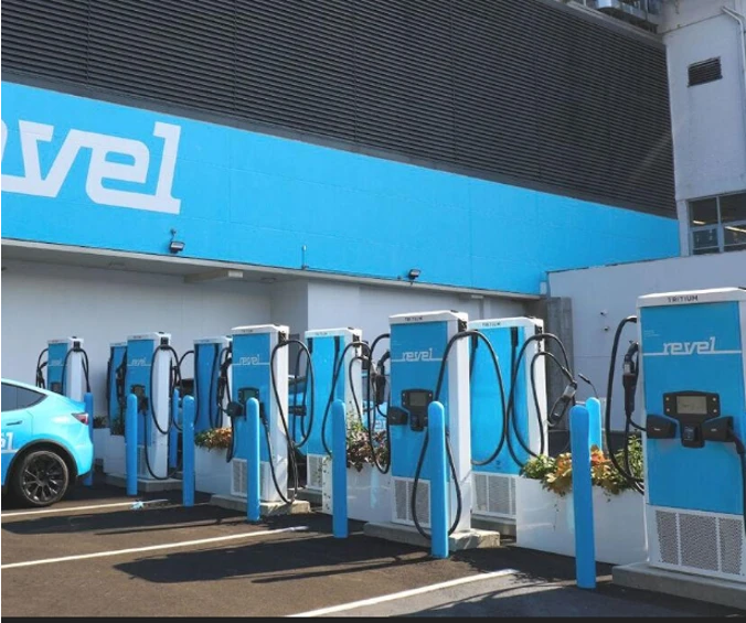 Row of Tritium RTM chargers at a Revel charging hub